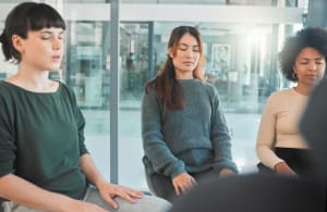 Shot Of A Group Of People Attending A Therapy Session Mindfulness for Suicide