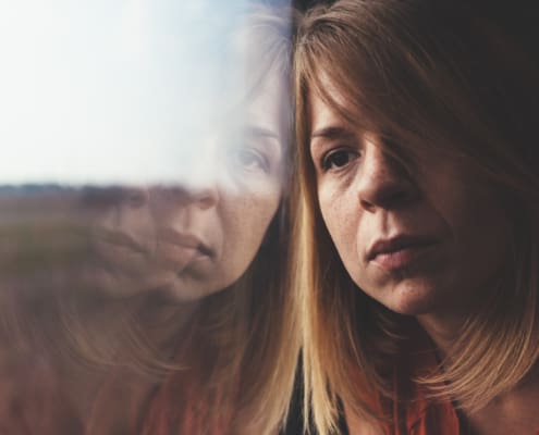 Woman In Train Alone And Sad